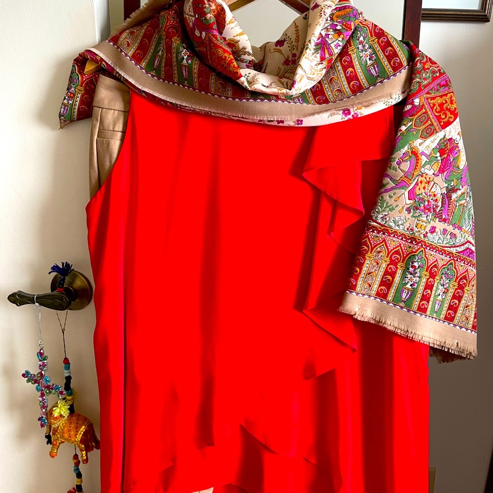 Red Joseph Ribkoff sleeveless blouse.